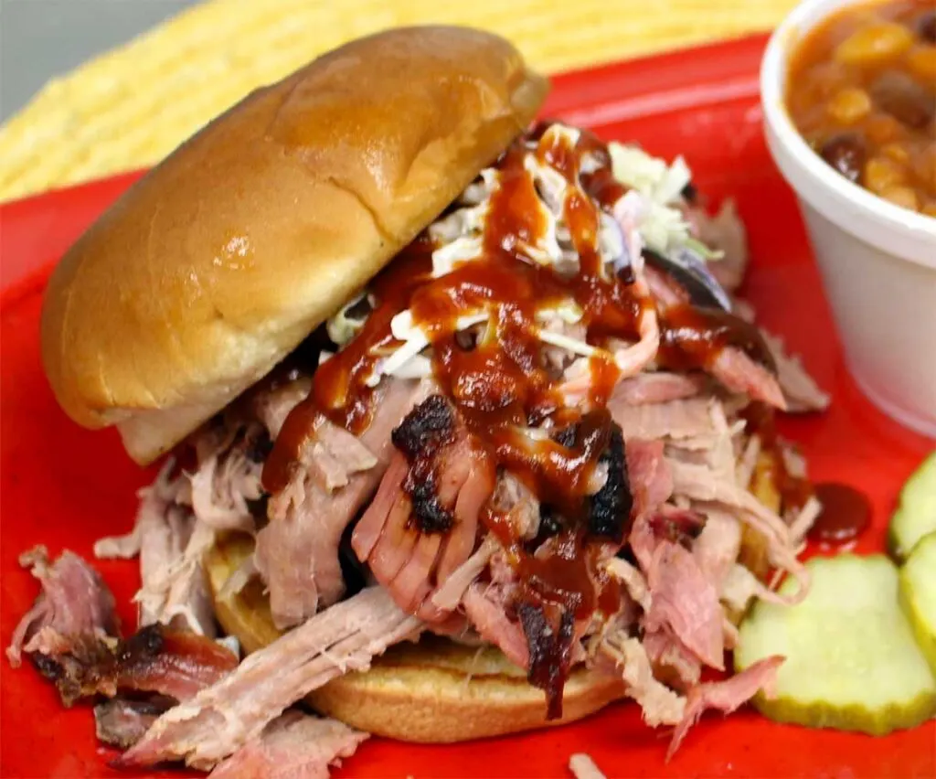 Closeup of Pompous Pig's BBQ sandwich with sauce