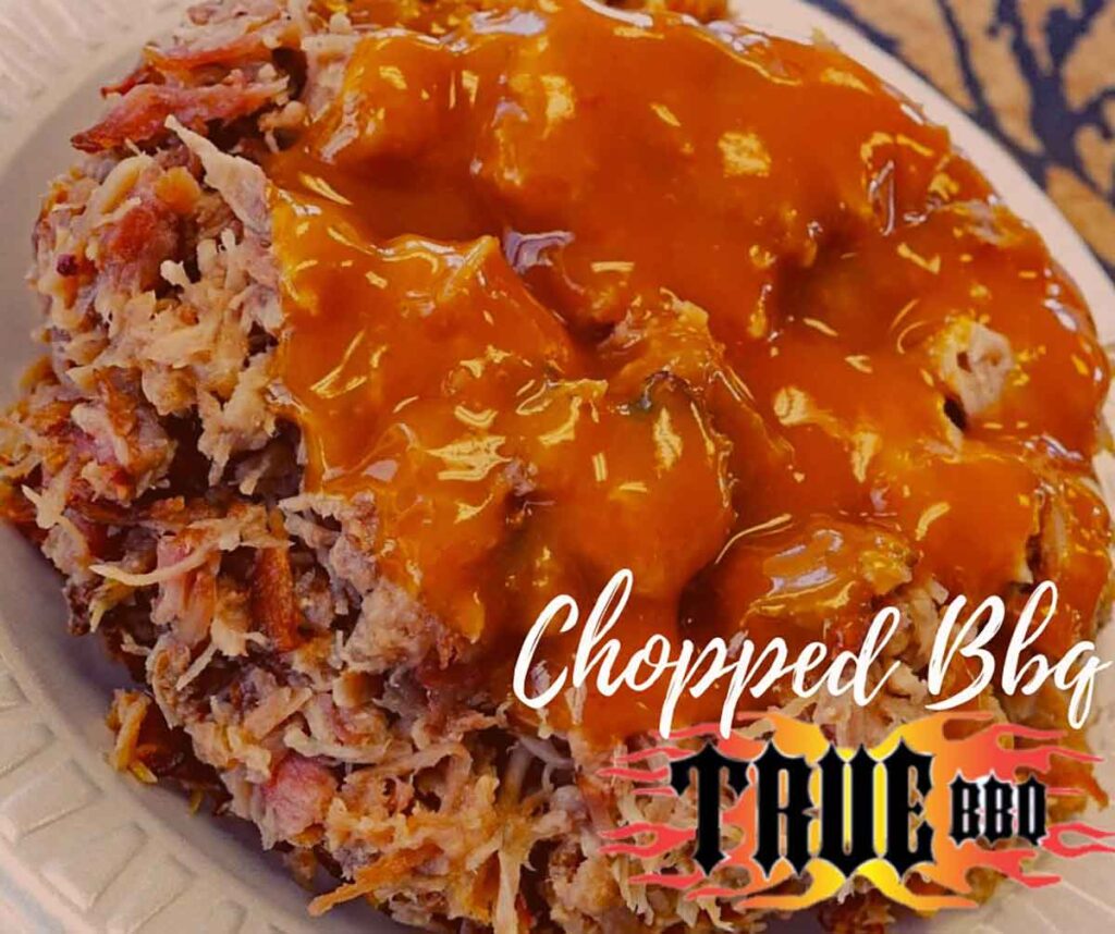 Chopped BBQ topped with BBQ sauce