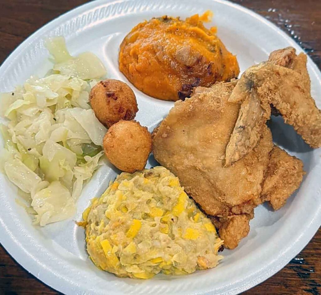 Fried chicken with three sides on a plate