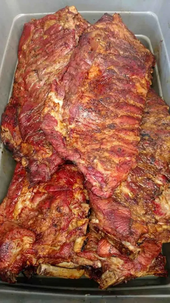 Ribs in a plastic food bin