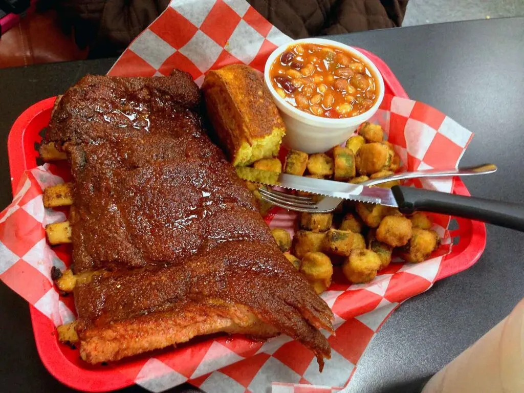 Tray of ribs, okra, cornbread, and Brunswick stew