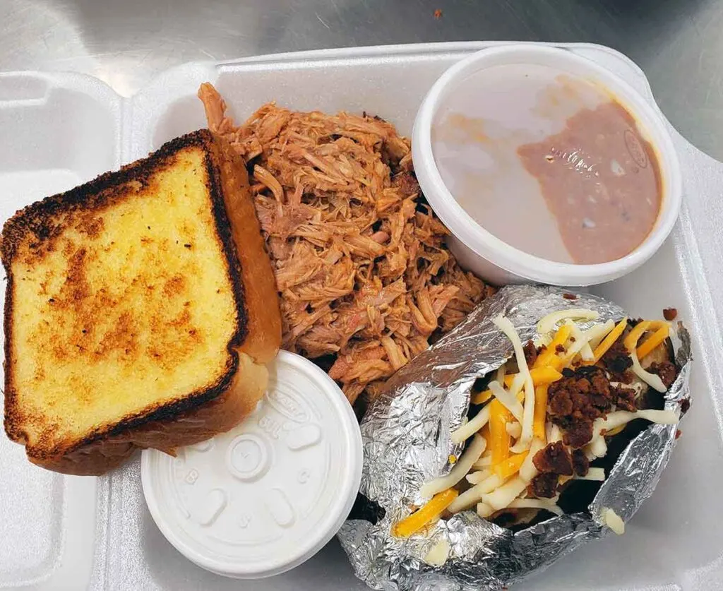 To Go Tray full of pulled pork and sides