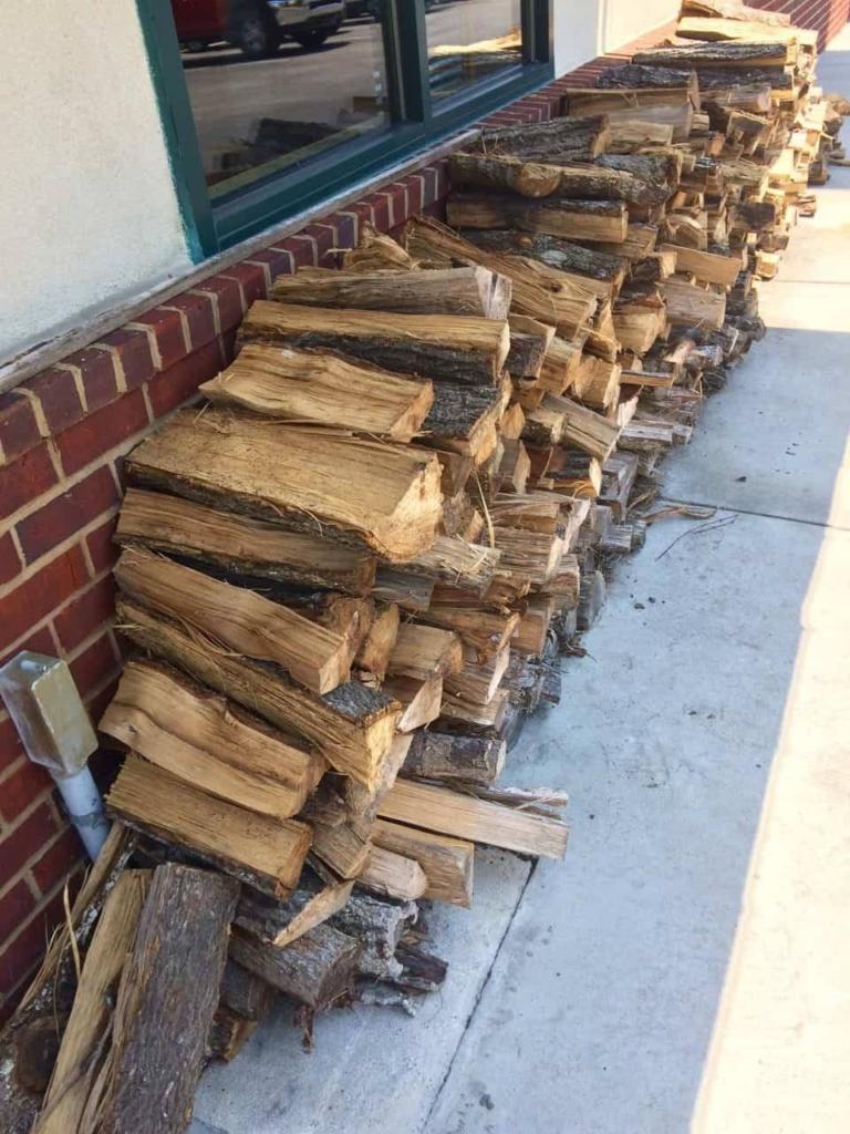 Oak firewood stacked outside of a restaurant in Myrtle Beach.