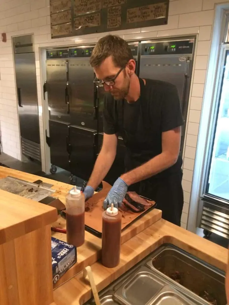 Lewis Barbecue - John Lewis Writing Brisket Weight on Butcher Paper