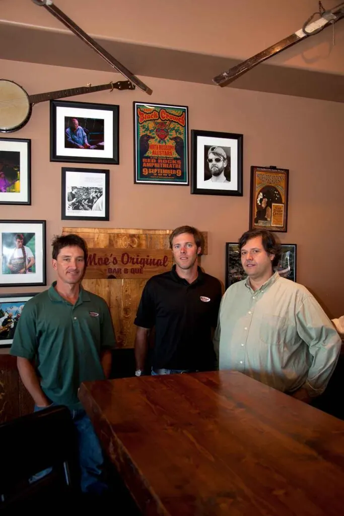 Founding partners of Moe's Original BBQ: Jeff Kennedy, Ben Gilbert, Mike Fernandez