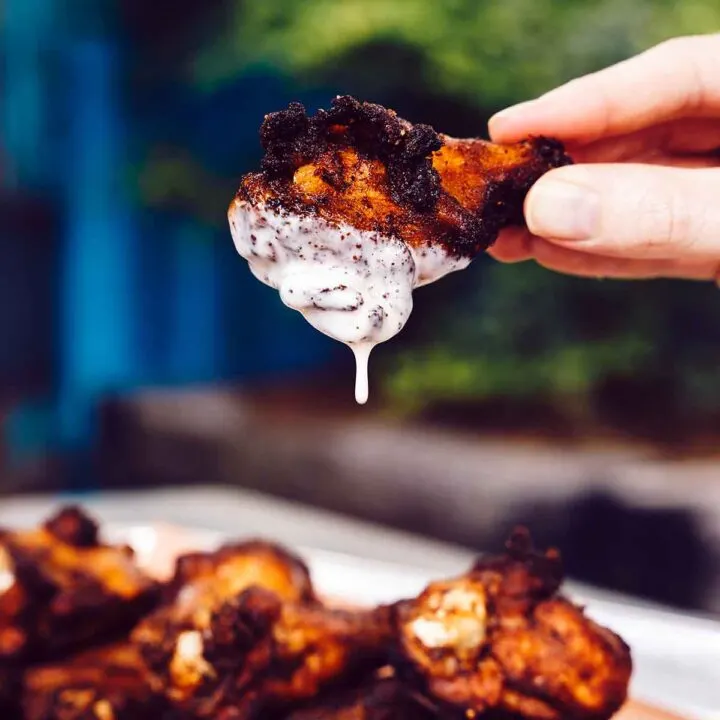 Home Team BBQ Smoked wing dripping Alabama White sauce