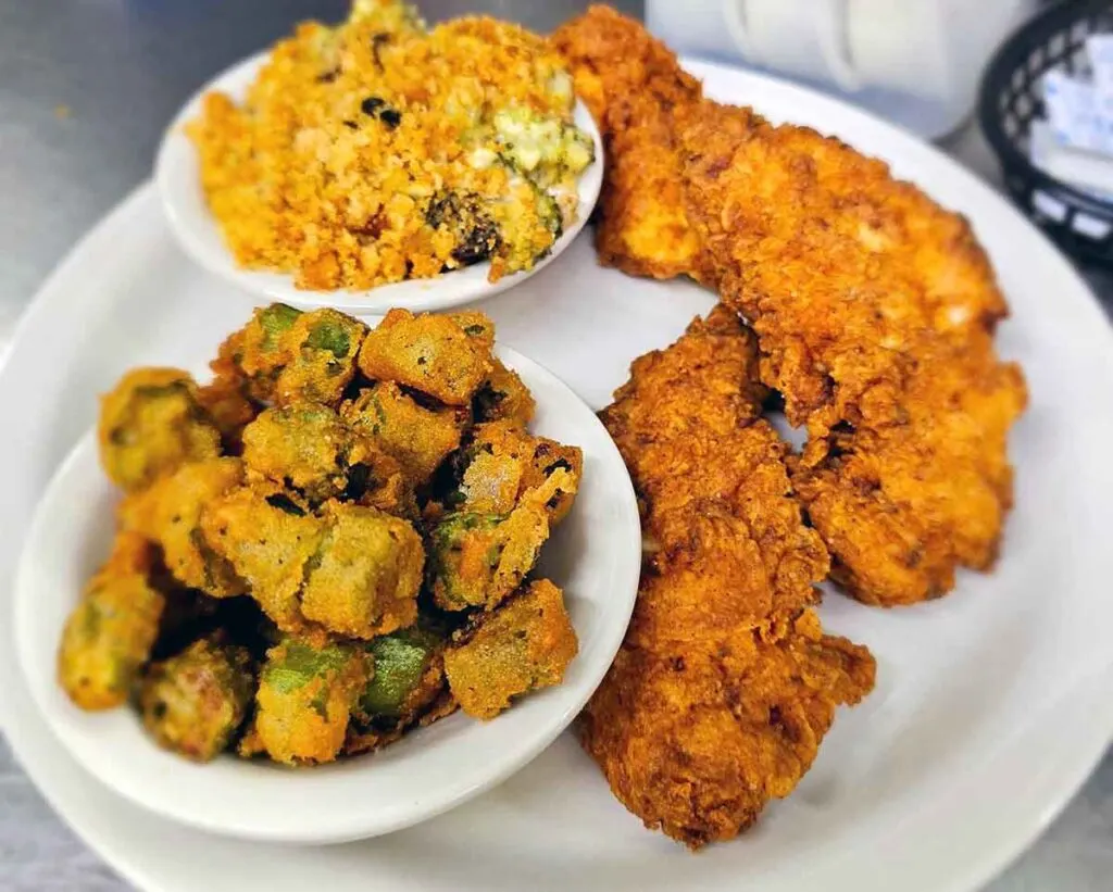 Fried chicken tenders with sides.