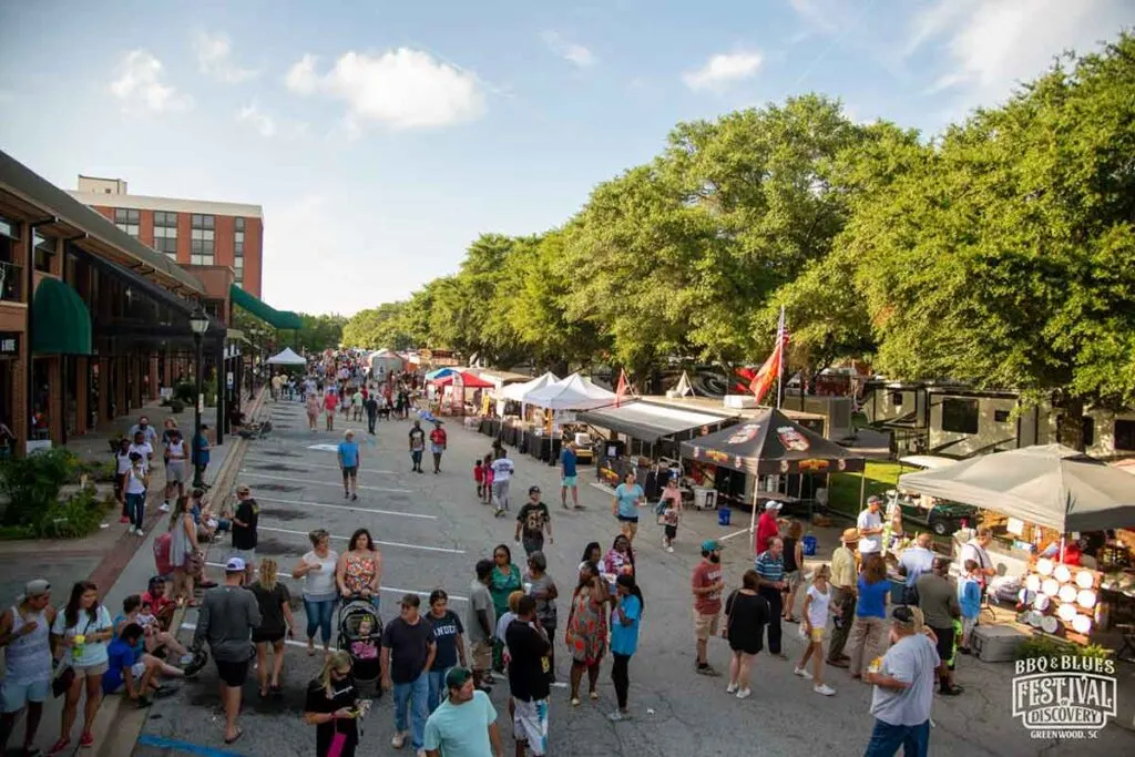 People on street at the Festival of Discovery in Greenwood.