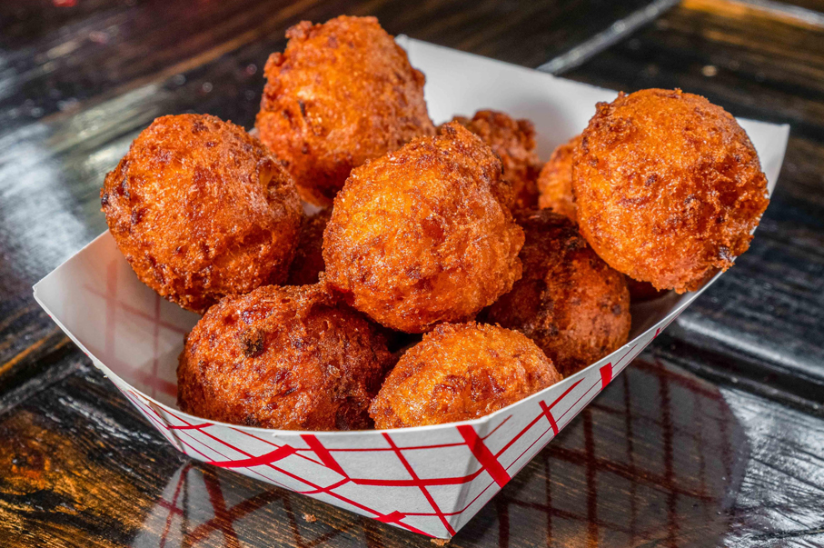 Maurice's Hush Puppies in paper tray.