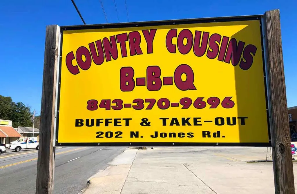 Sign for Country Cousins BBQ in Olanta