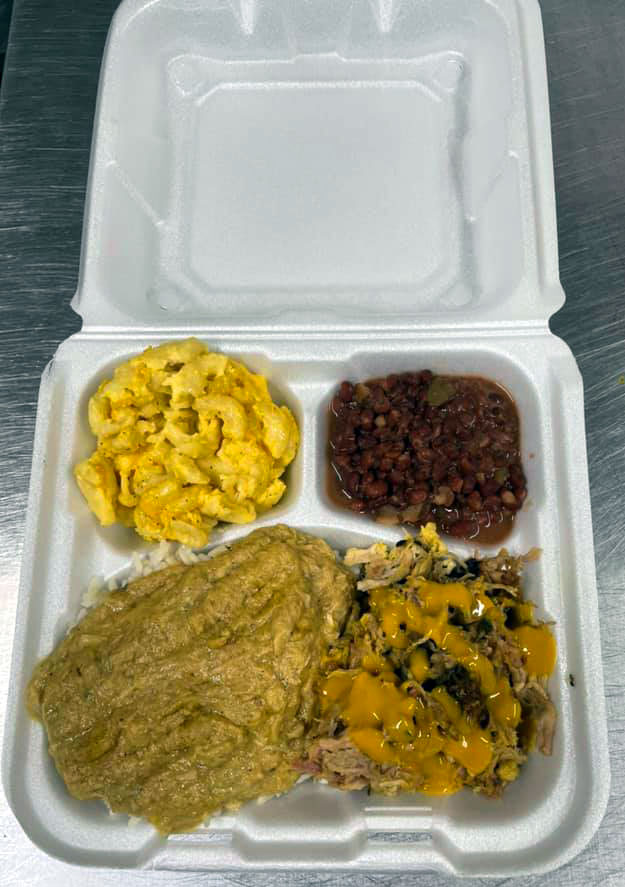 Hash, pulled pork with mustard sauce, Mac n cheese, baked beans in a styrofoam container