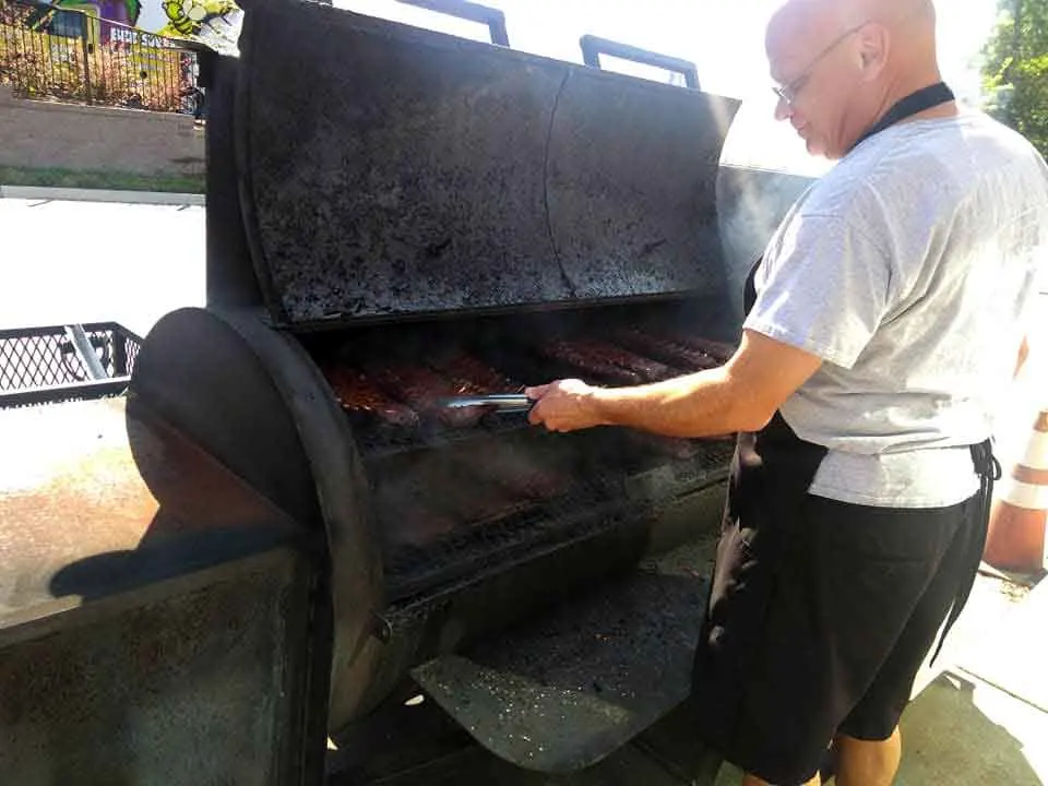 Kenny Wells Working Grill at PK BBQ.