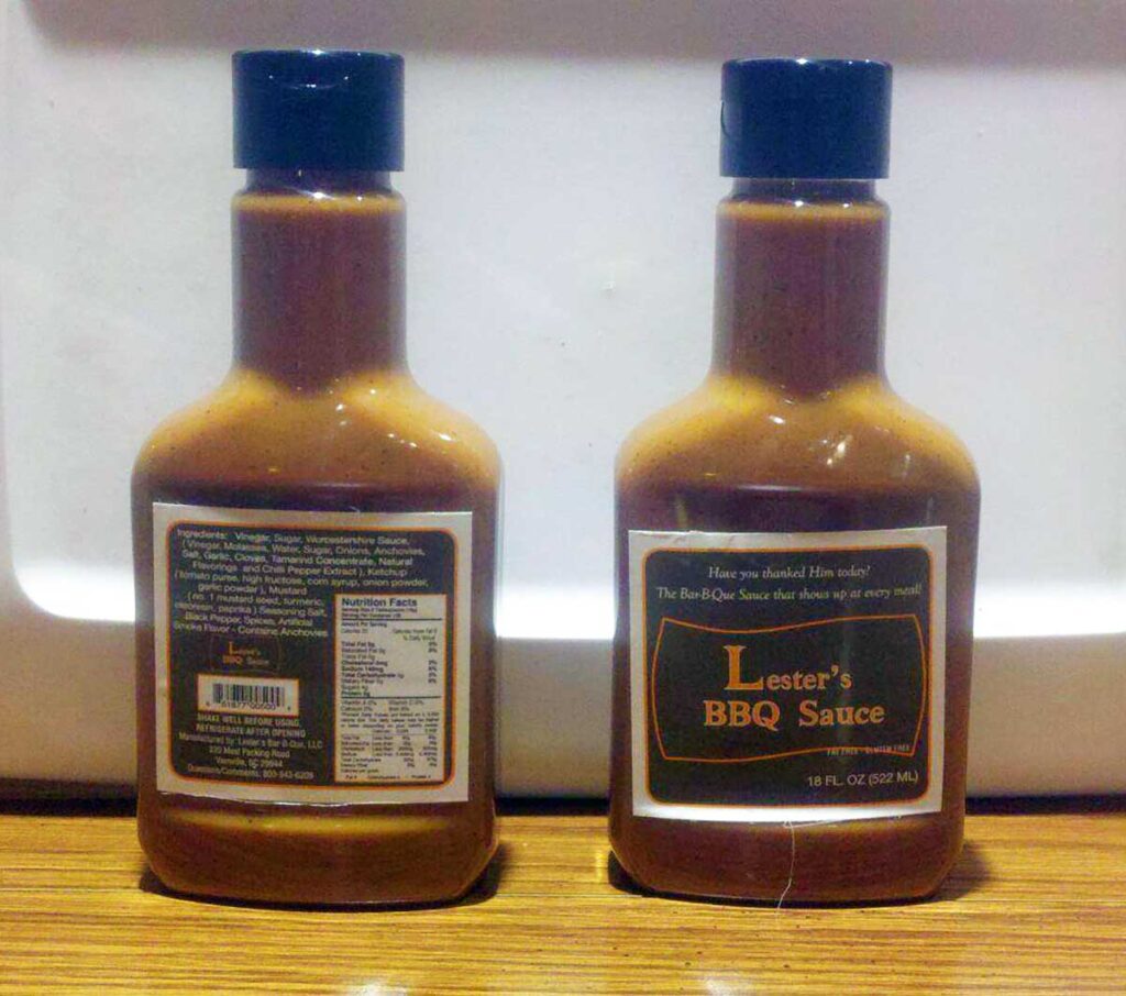 Two bottles of Lester's BBQ Sauce