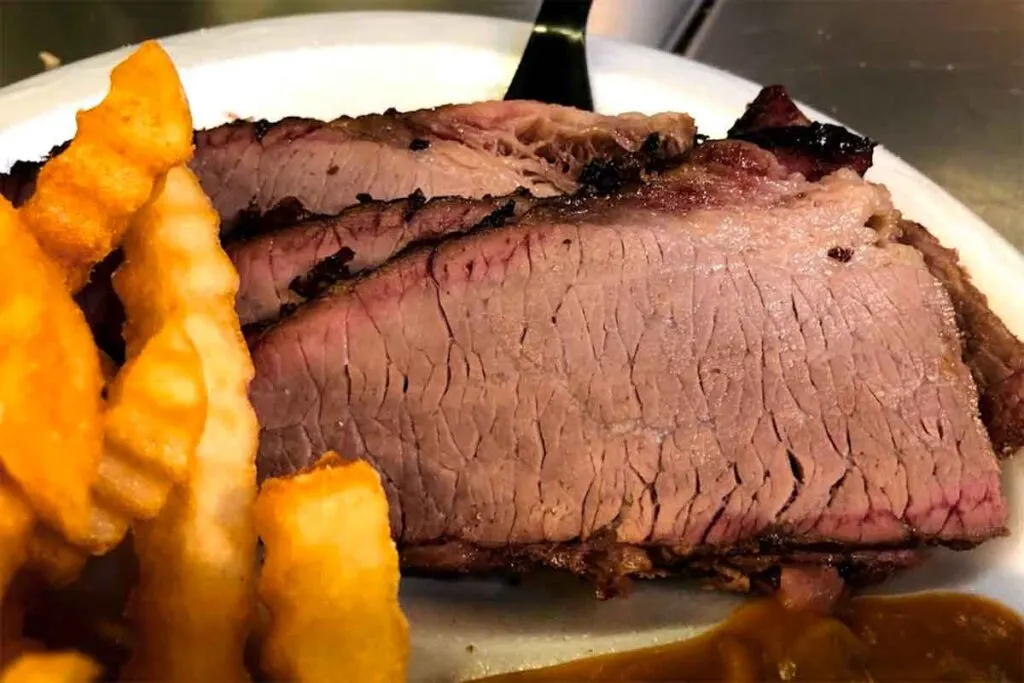 Closeup of three slices of brisket