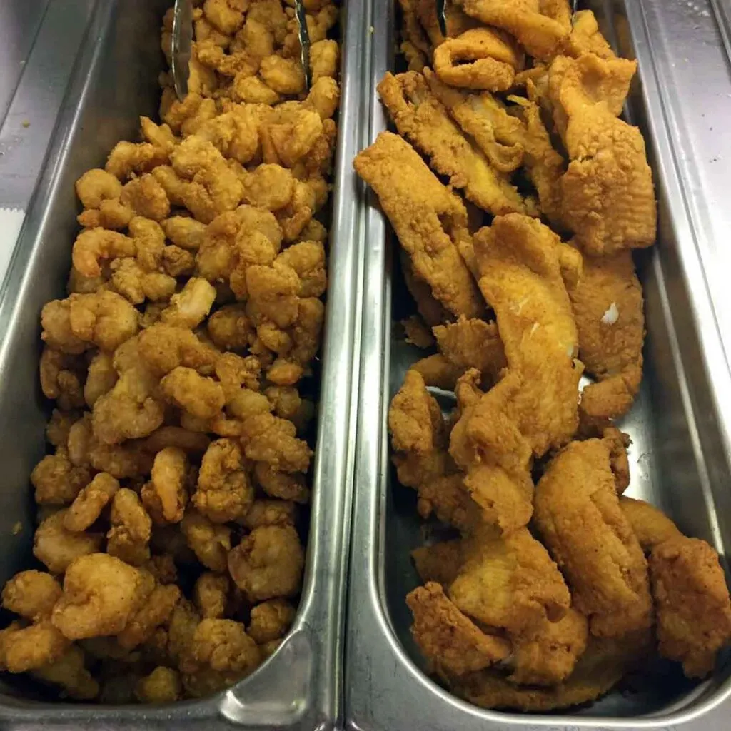Fried shrimp and fish on the buffet.