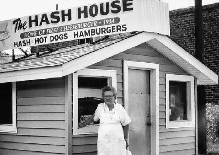 Miss Ruth standing in front of The Hash House in Greenwood.