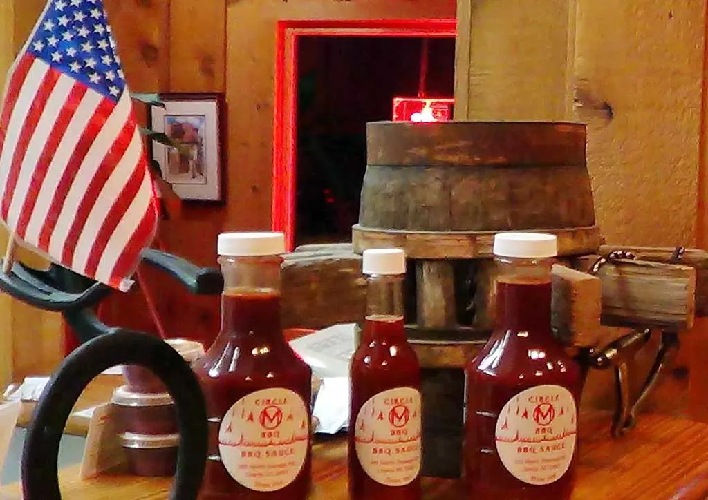 Bottles of Circle M's Vinegar-Based BBQ Sauce