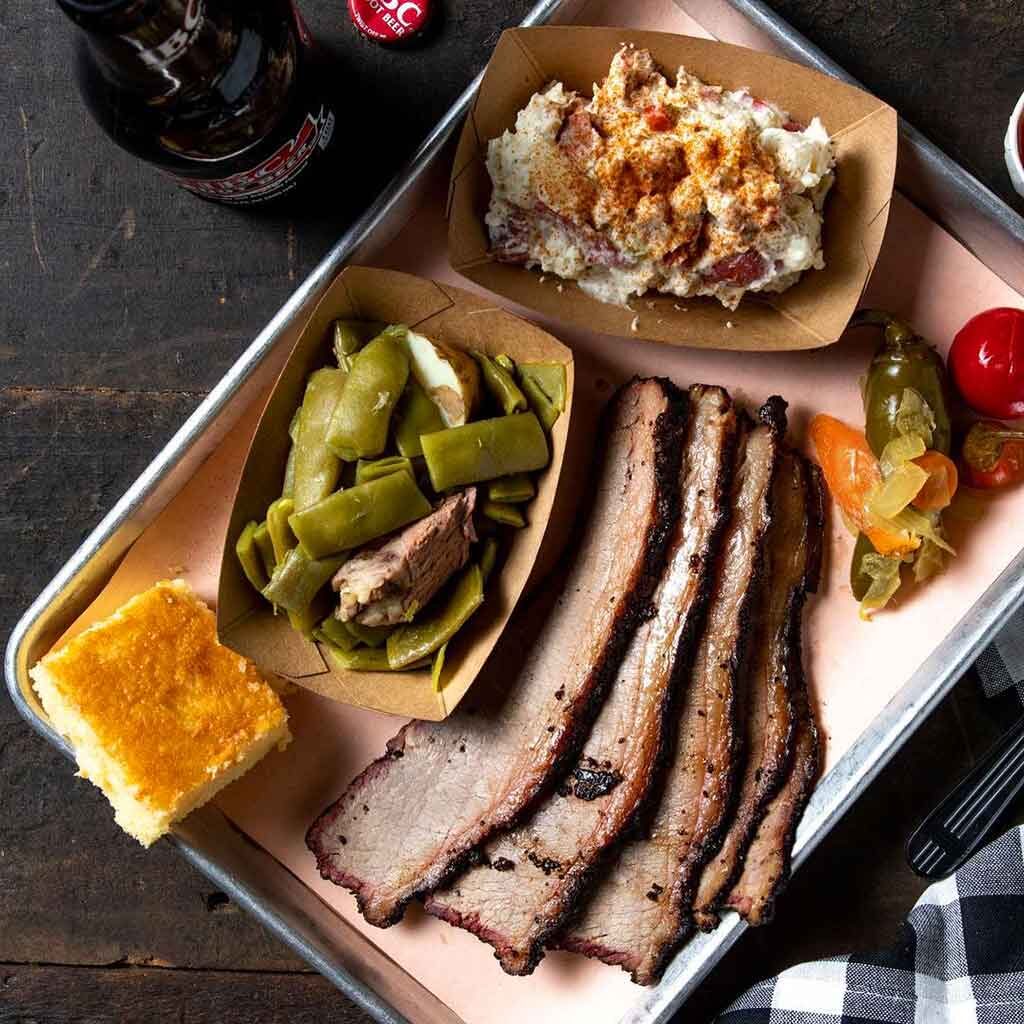 Brisket platter with potato salad and green beans, pickles and cornbread from Melvin’s Legendary Bar-B-Que