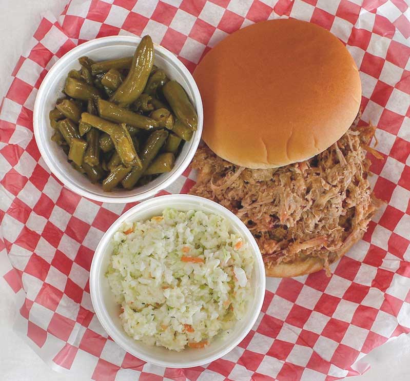Carolina Barbecue and More BBQ Sandwich Plate with green beans and coleslaw.