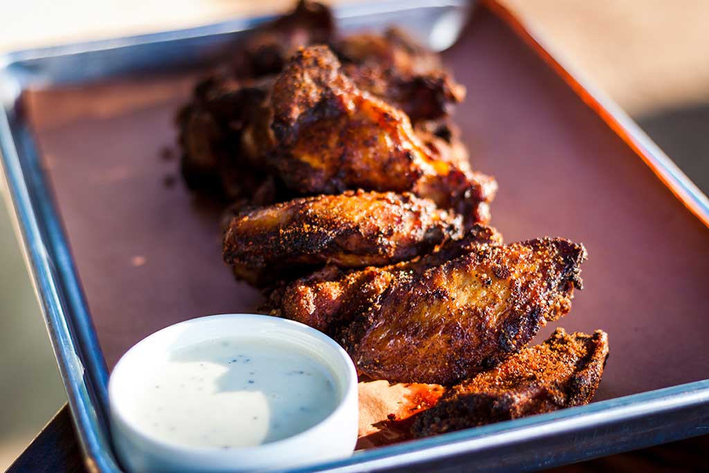 Chicken wings and Alabama White Sauce from Home Team BBQ.
