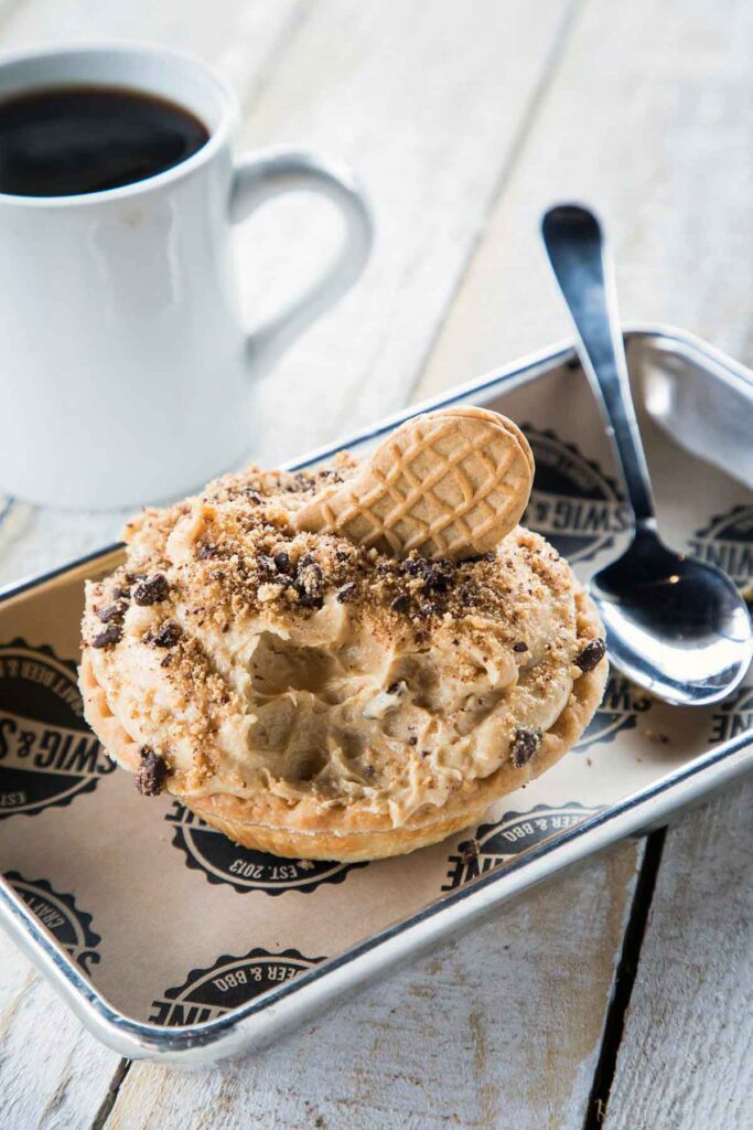 Nutter Butter Pie on tray with coffee in background