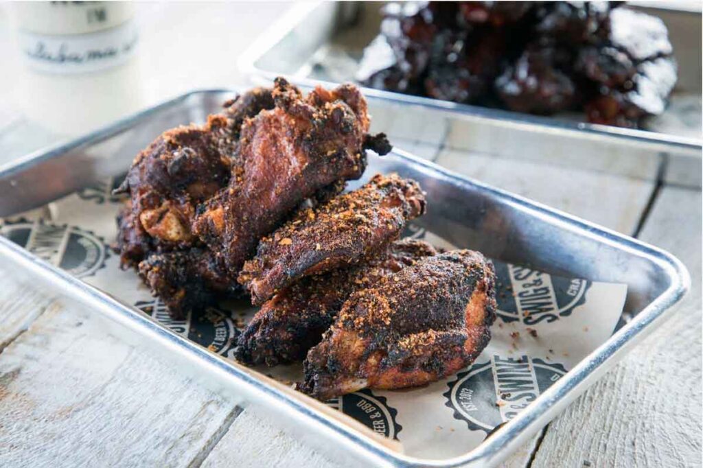 Pile of chicken wings on tray