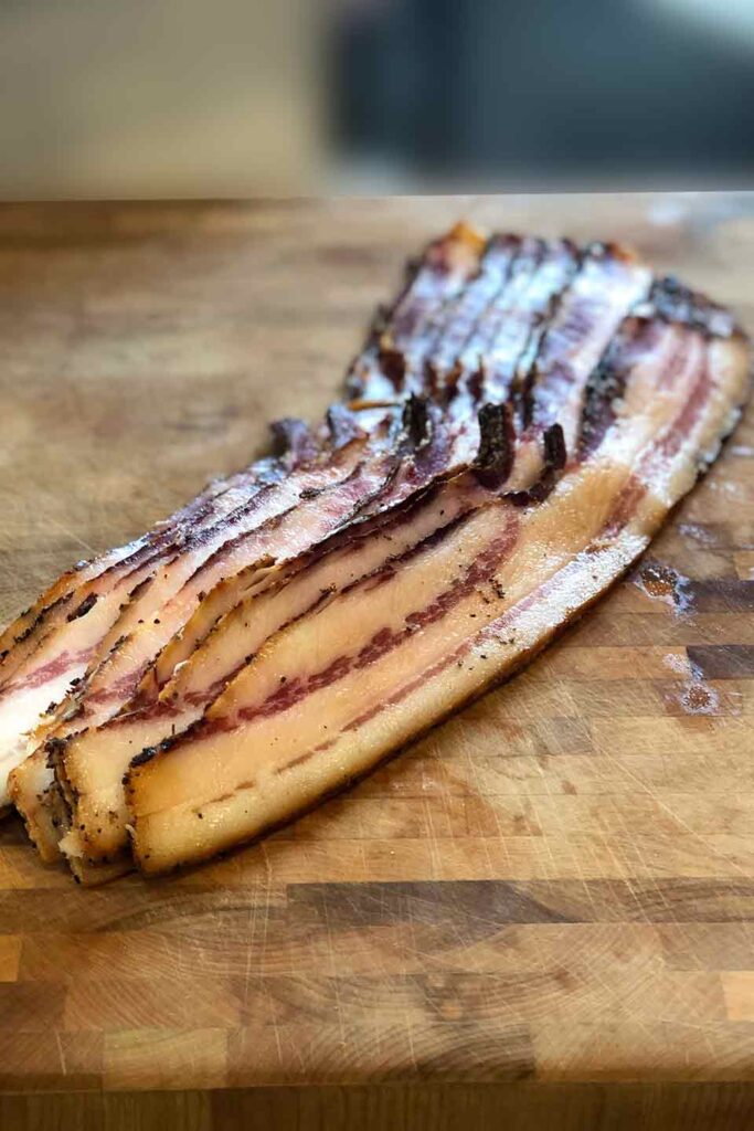 Slices of Wild Boar Bacon from Chef Anthony Gray's recipe.