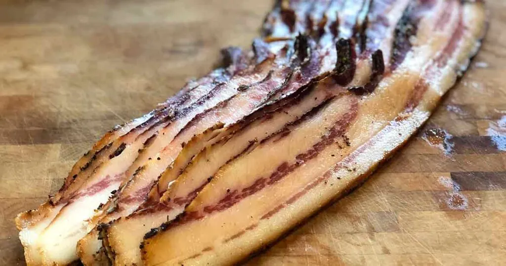 Slices of Wild Boar Bacon from Chef Anthony Gray's recipe.