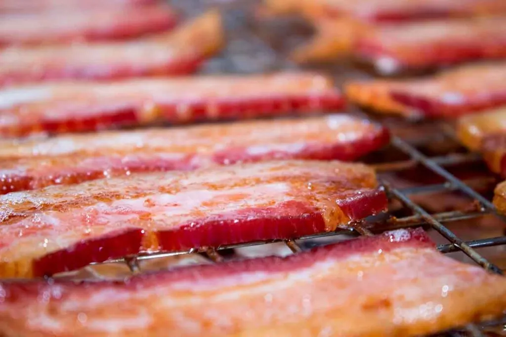 Bacon cooking on wire rack