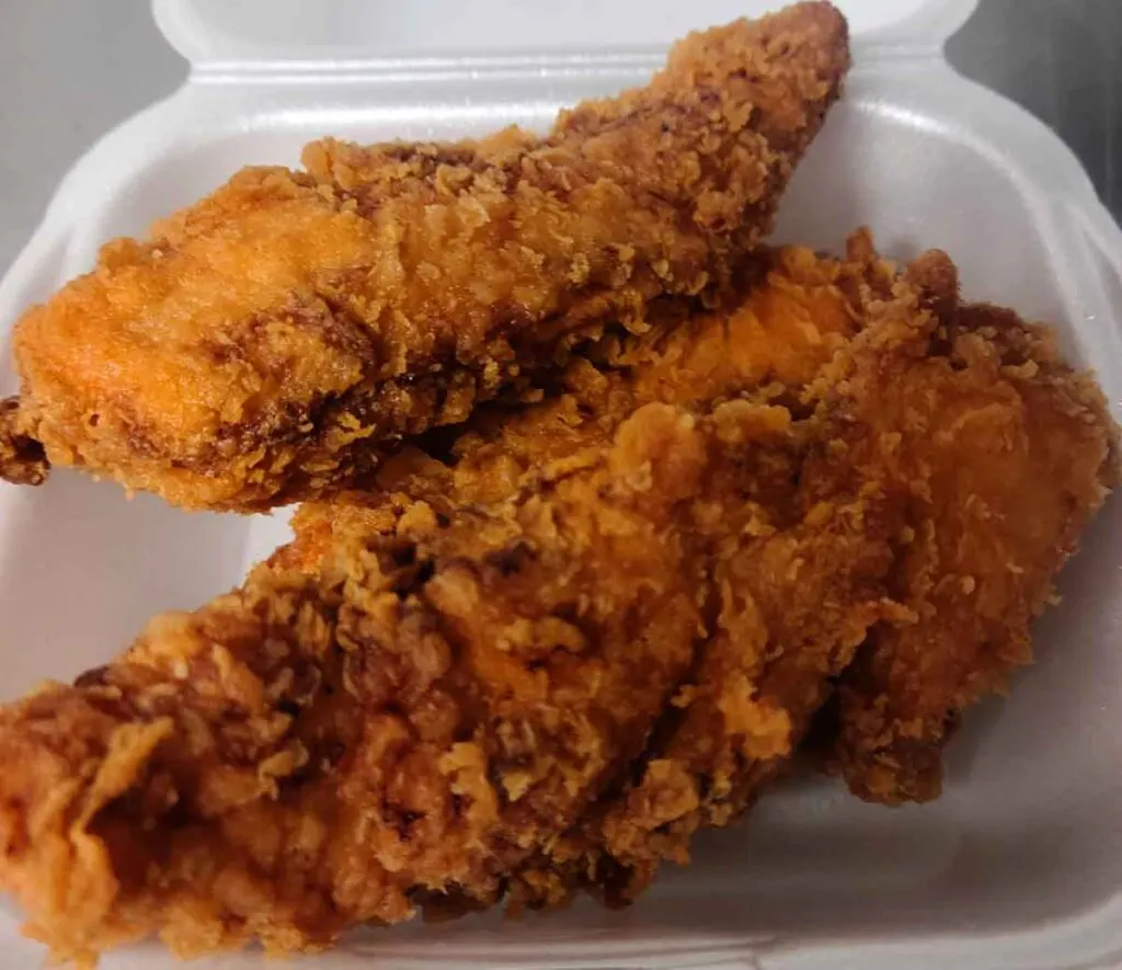 Chicken tenders in styrofoam take-out container
