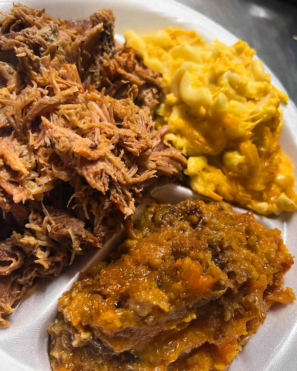 Chopped pork, Mac and cheese, and sweet potato casserole.