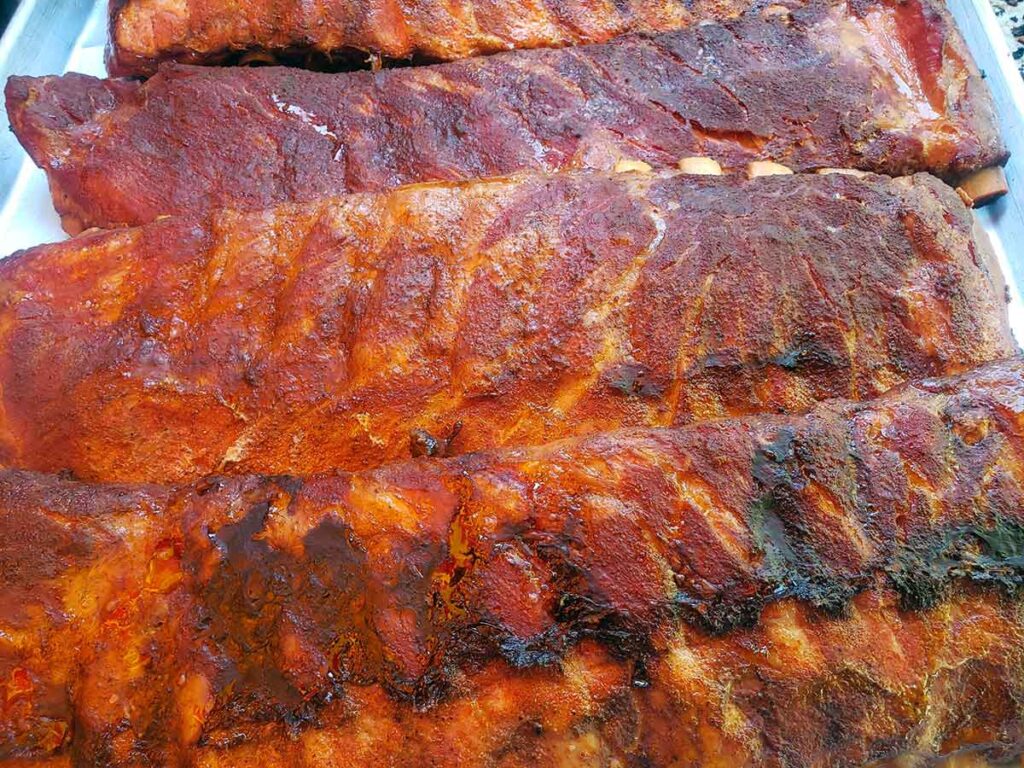 Several slabs of cooked ribs