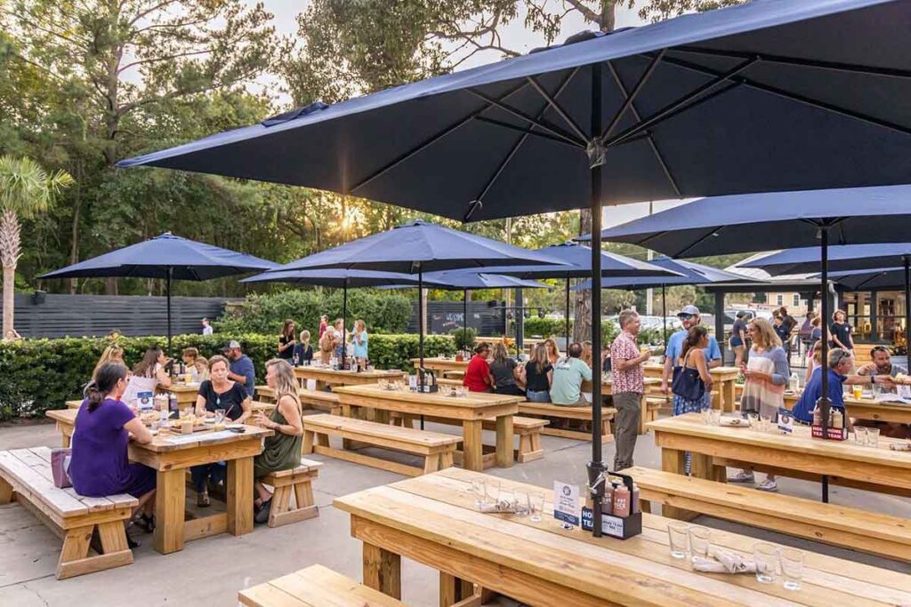 Picnic tables behind Home Team BBQ's Mount Pleasant restaurant.