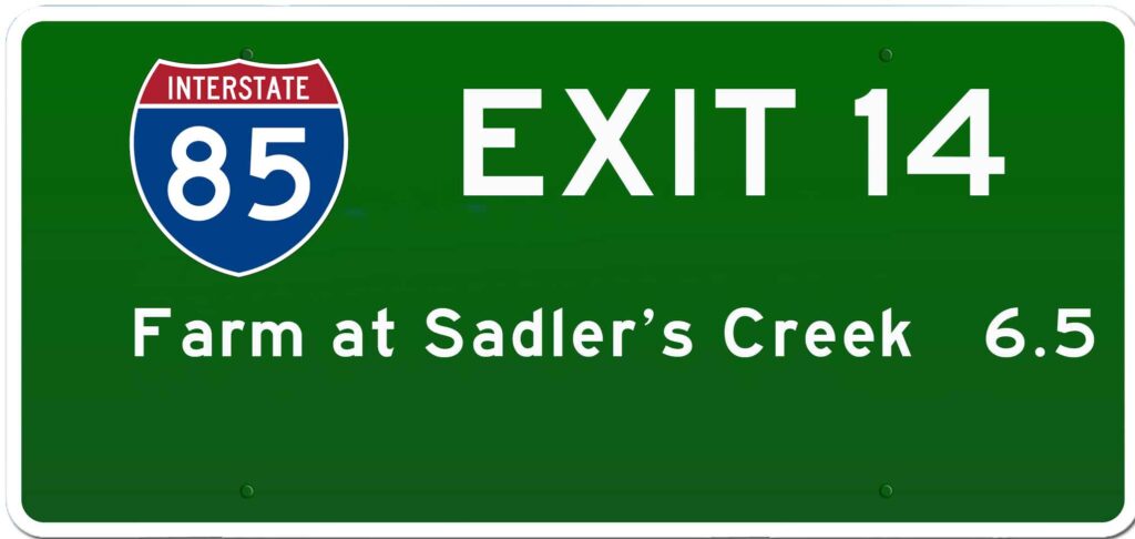 Green road sign for Exit 14 of I-85