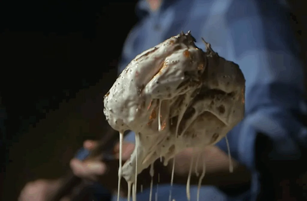 Grilled smoked chicken dunked in Alabama white sauce.