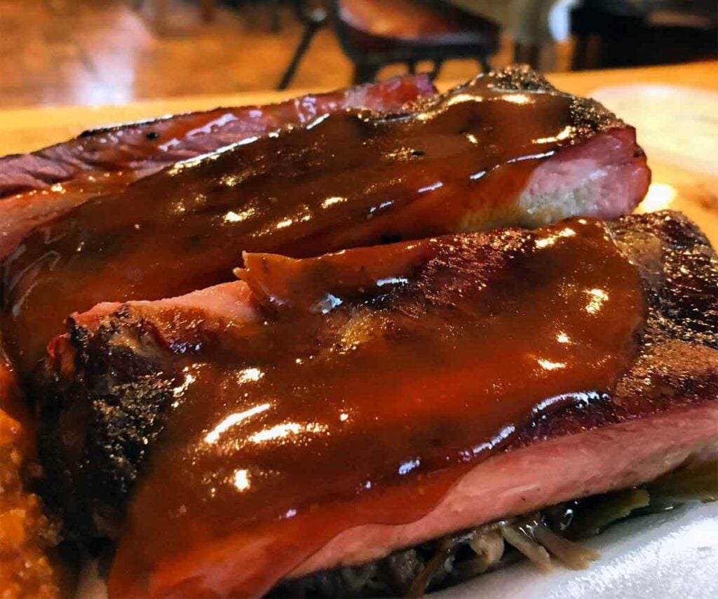 Closeup of sauced ribs.