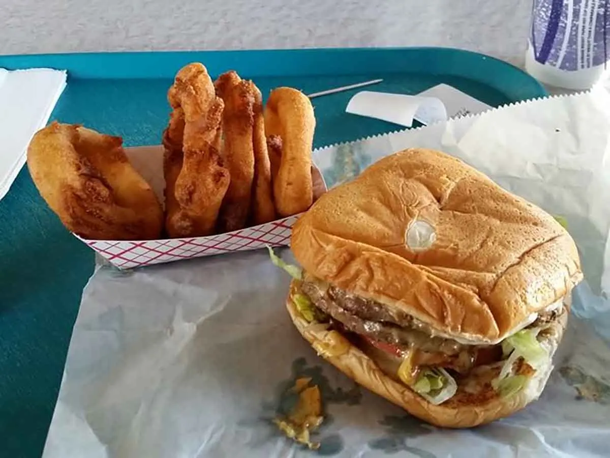 Double cheeseburger with onion rings.