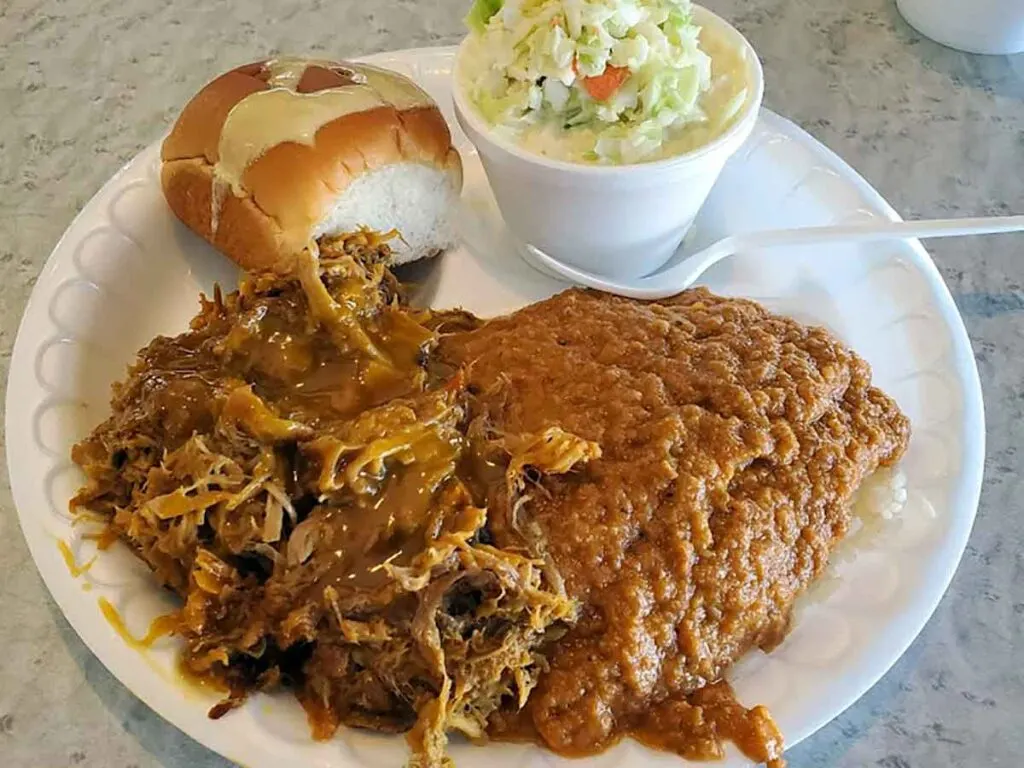 BBQ and hash with slaw and roll.
