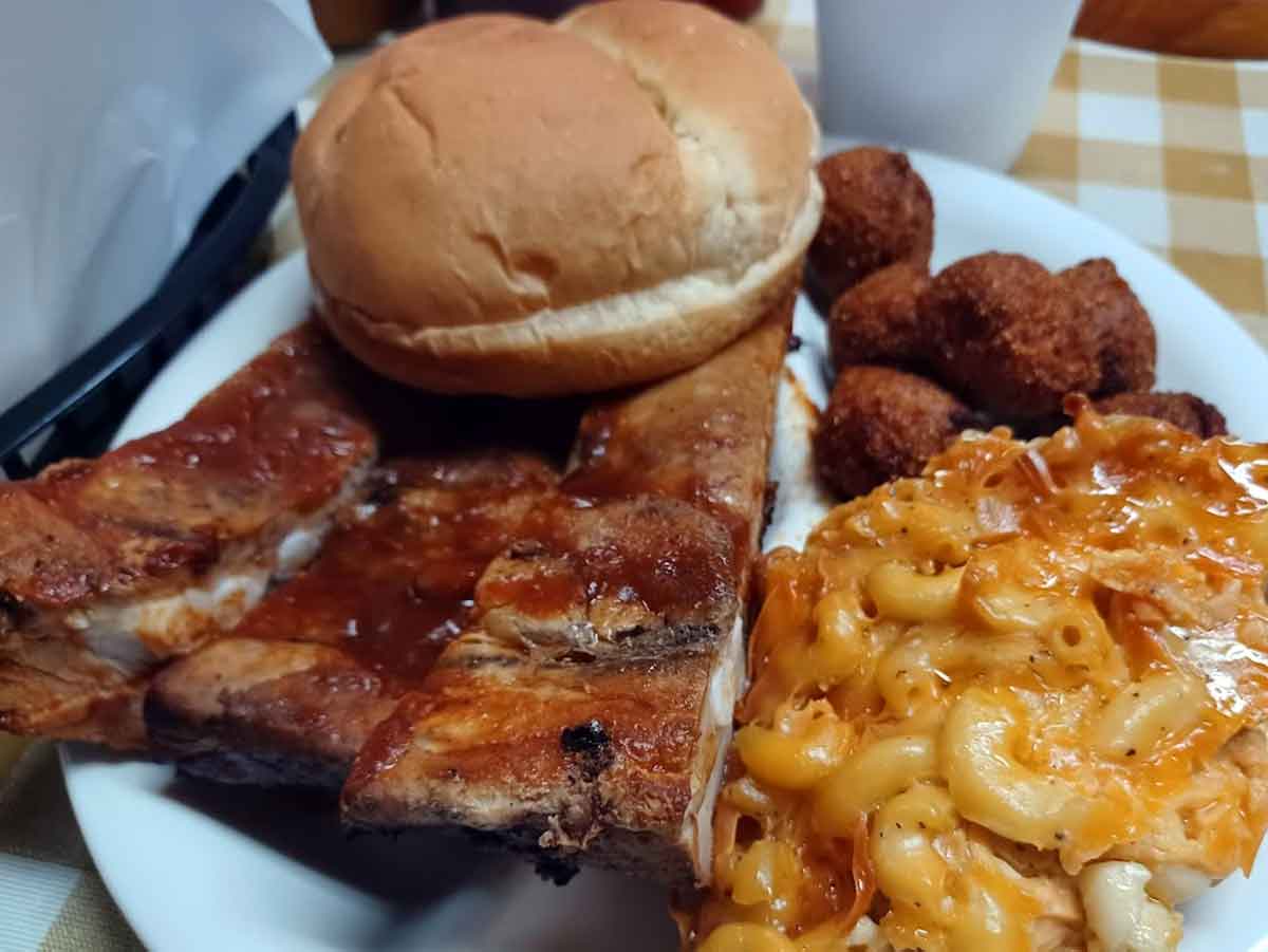 Ribs with Mac and cheese and hush puppies.