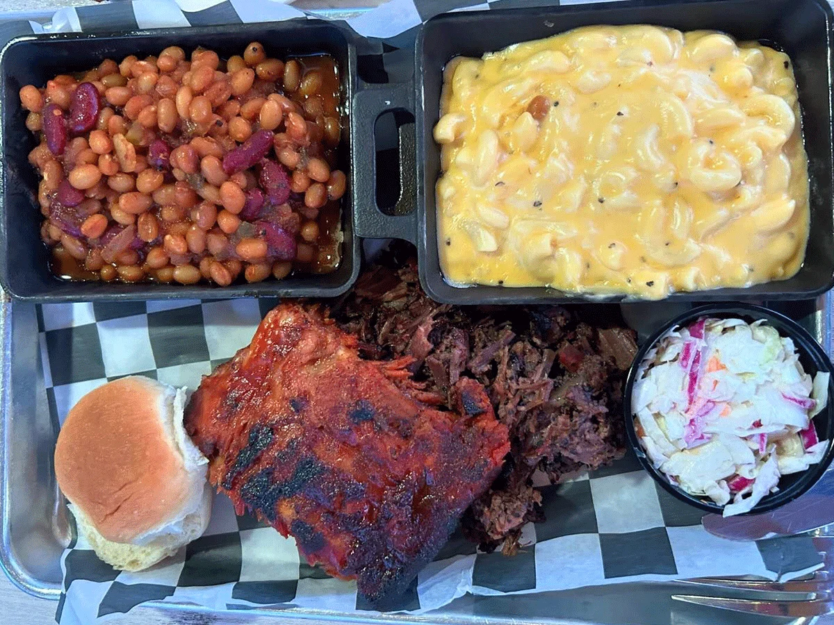 Ribs and pulled pork with sides.