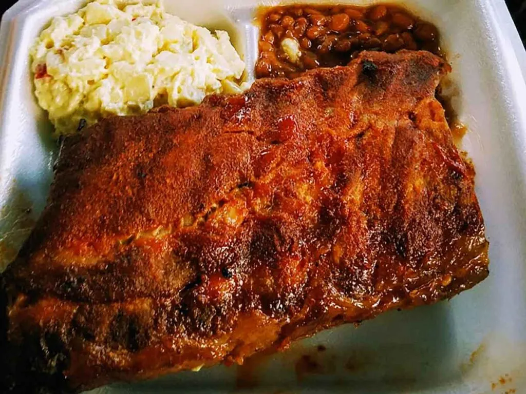 Rack of ribs with sides.