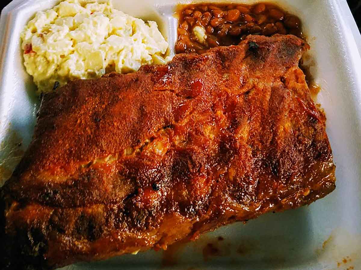 Rack of ribs with sides.