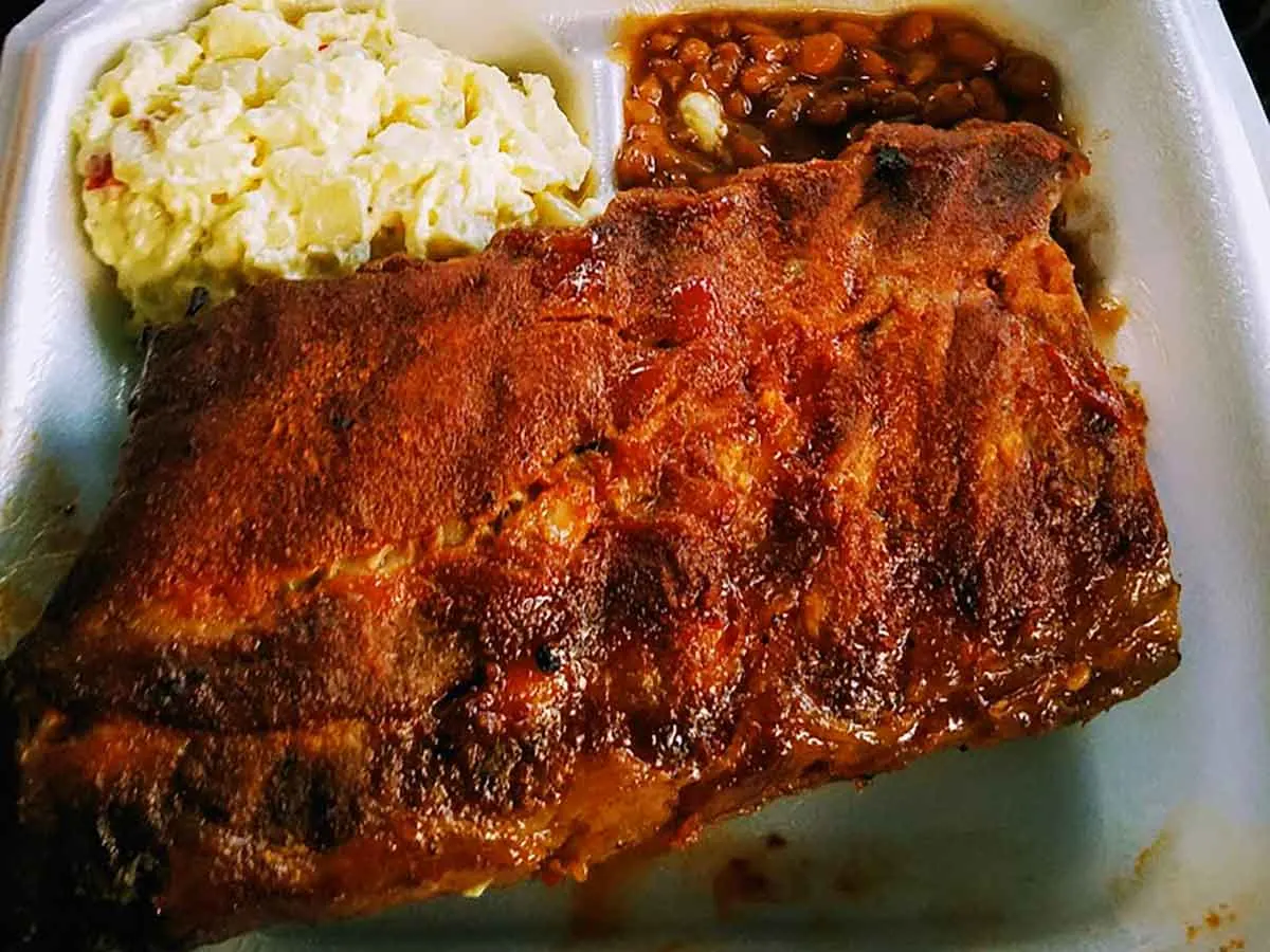 Rack of ribs with sides.