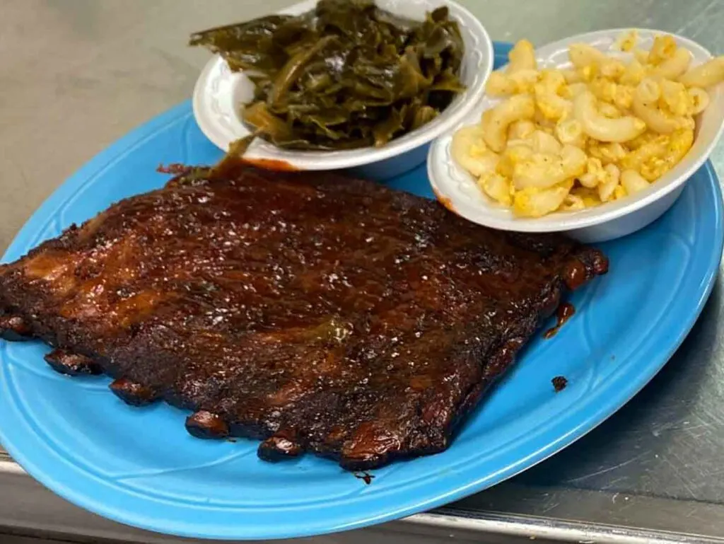 Rack of ribs with collards and Mac and cheese.