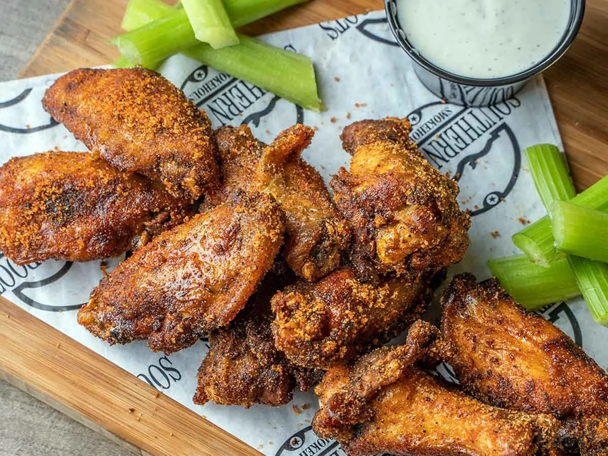 Wings with celery and sauce. 