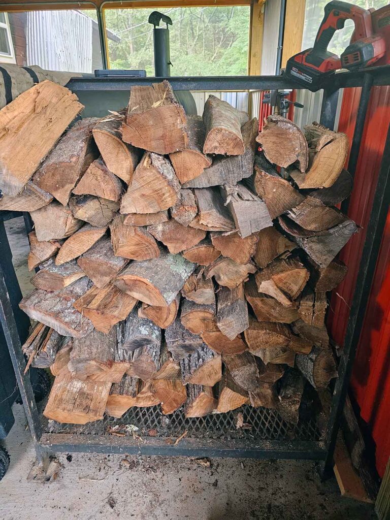 Rack of wood logs for smoker (in background).