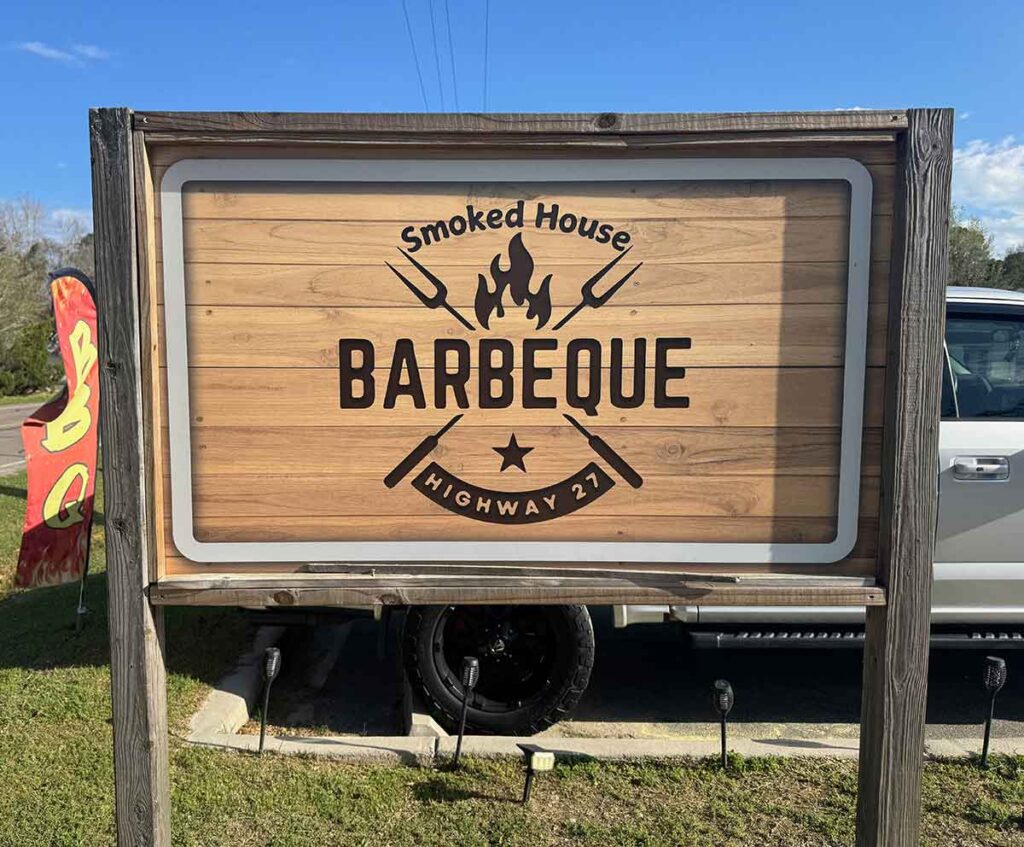 Sign outside of Hwy 27 Smoked House BBQ.