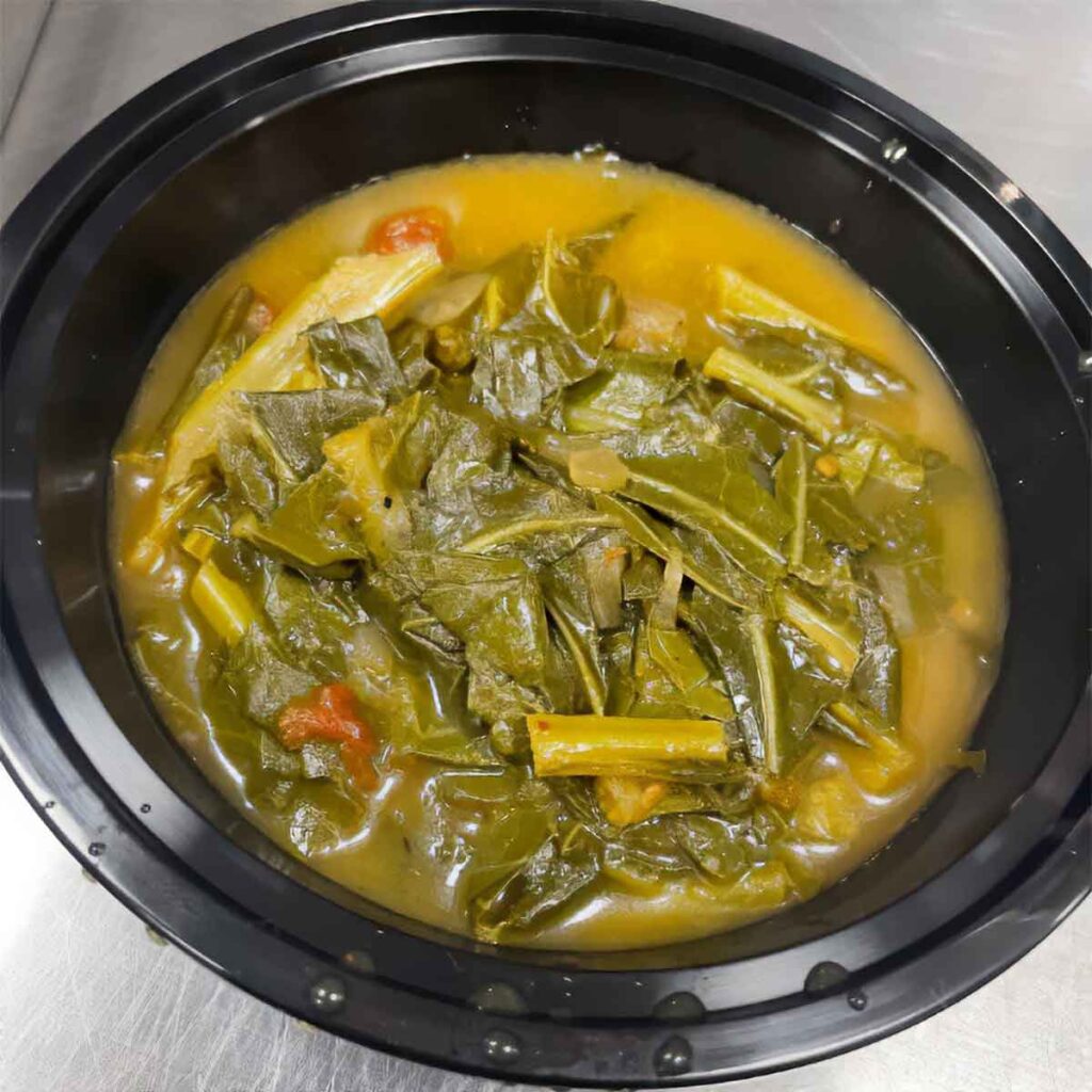 Bowl of collard greens in broth from Moohogz.