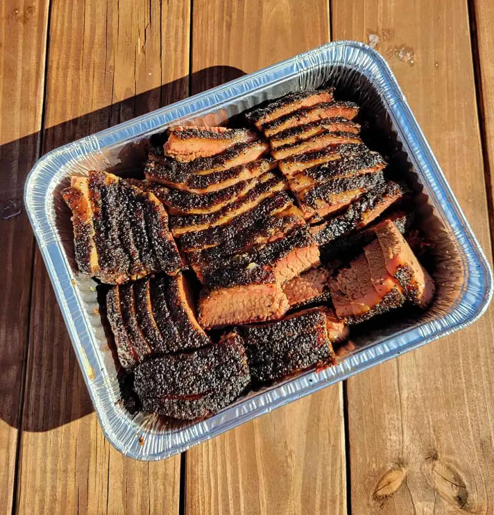 Tray of brisket slices at Roller Mills Smokehouse.