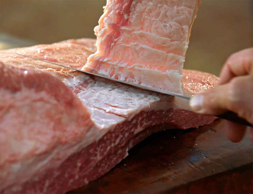 Aaron Franklin trimming a full packer brisket.